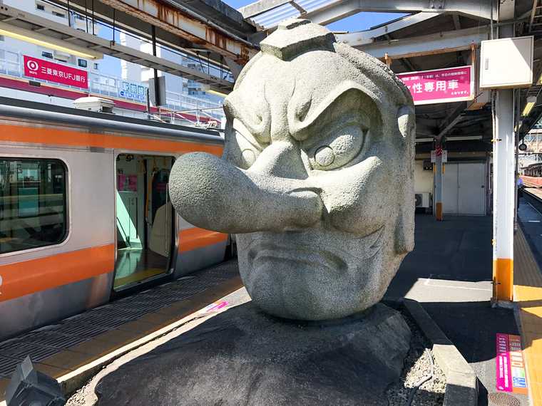 Tengu statue at Takao Station