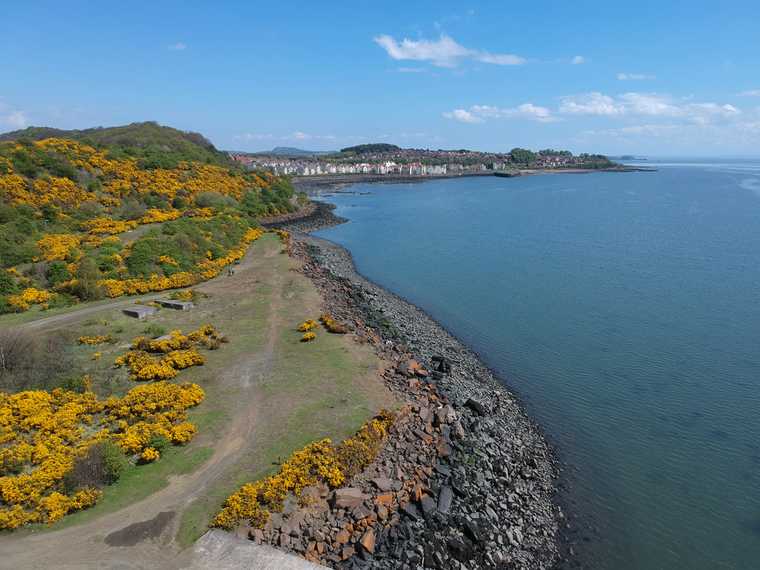 A photograph of the coast and Dalgety Bay taken from the air.
