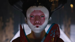 Promotional image from Ghost in the Shell (2017). A robot humanoid with a geisha-like appearance.