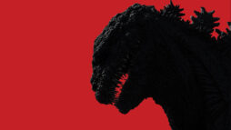 Godzilla's silhouette on a red background.