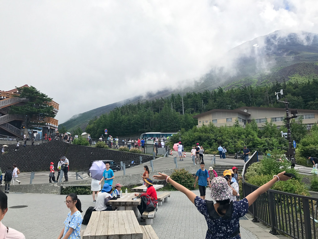 Visitors getting their photos taken at the 5th station of Mt Fuji