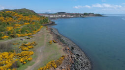 A photograph of the coast and Dalgety Bay taken from the air.