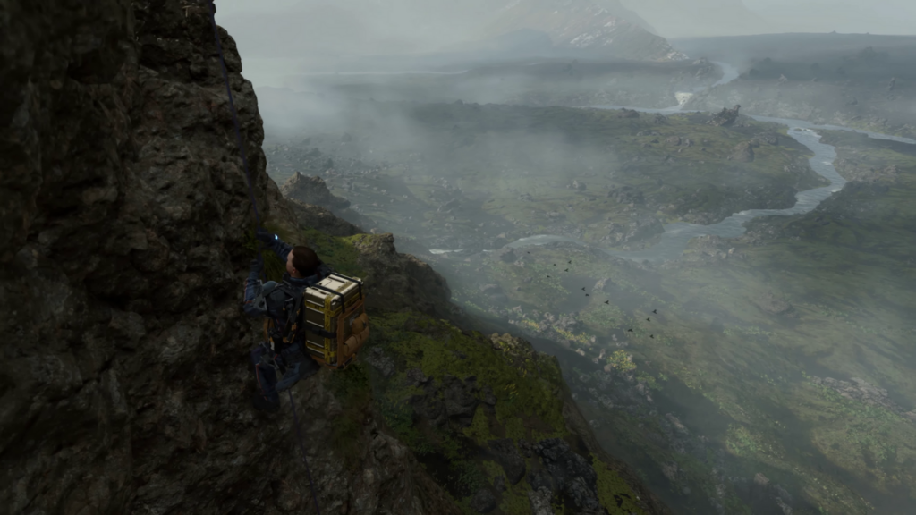 Death Stranding screen capture - Norman Reedus' character climbing a cliff-face