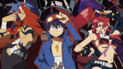 Three protagonists from the Gurren Lagann animated series stand in line. A topless blue haired man (Kamina), a young boy wearing goggles (Simon) and red-haired bikini wearing woman (Yoko).