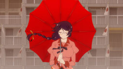 Promotional image from Kizumonogatari III: Reiketsu. Hanekawa Tsubasa, a young high school student with long plaited ponytail, standing in front of an apartment block holding a red umbrella.