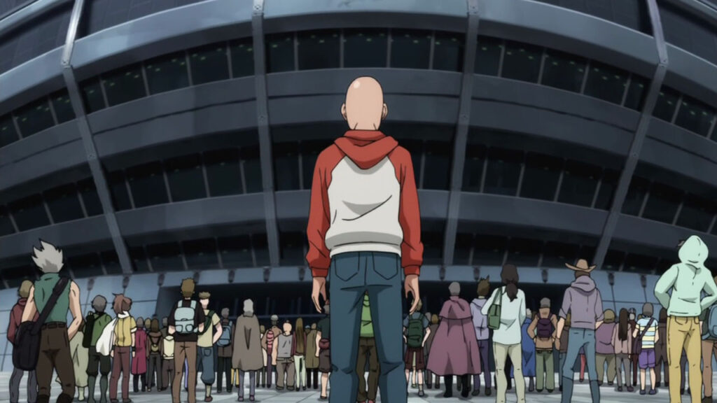 Screen capture from One Punch Man. Bald male protagonist, Saitama, walks towards a stadium with a crowd of others.